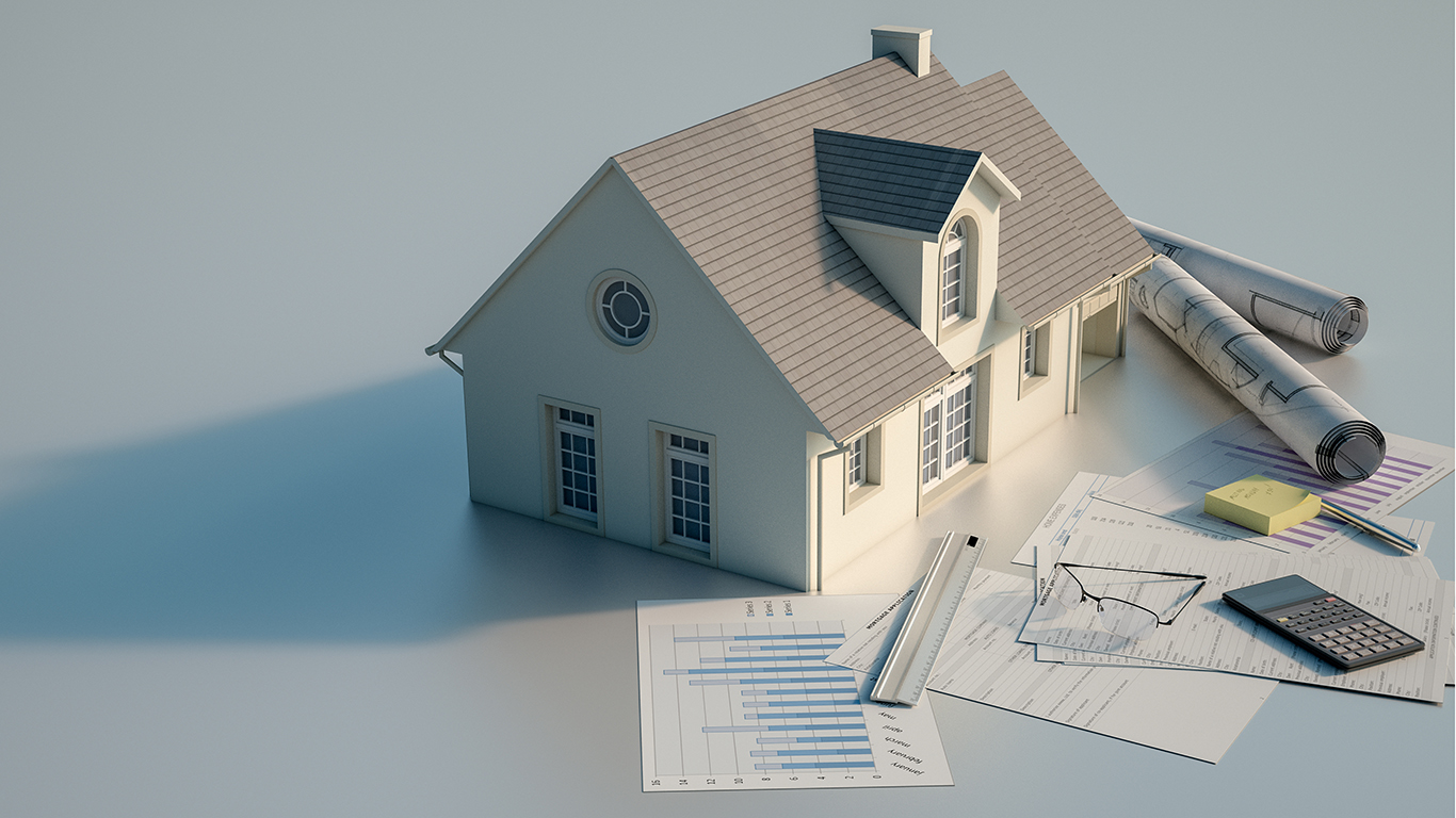 3D rendering of a house with blueprints, charts, mortgage application form, budget and calculator